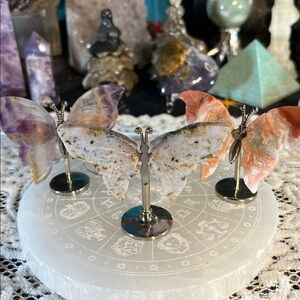 Small butterfly carving on stands